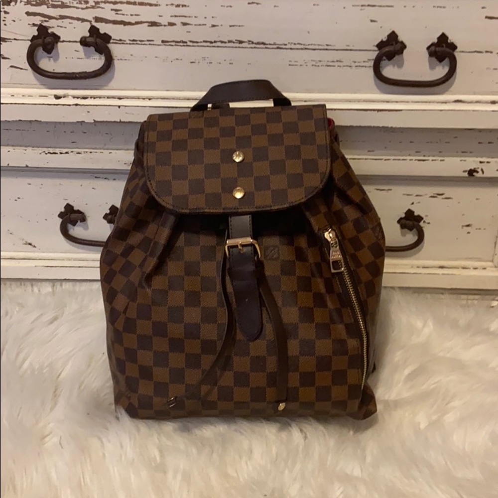 Brown checkered backpack